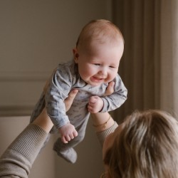 Tutina neonato + scarpine in cotone biologico DIRKJE NOOS